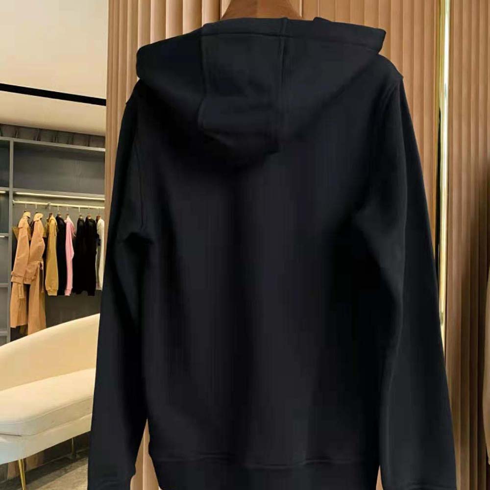 Side profile showing zipper closure on Burberry cotton hoodie
