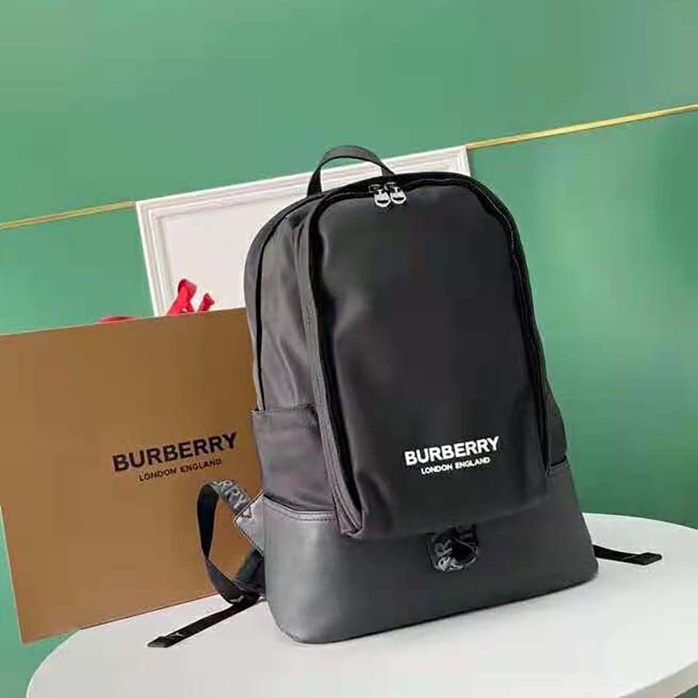 Side profile showing adjustable straps on Burberry Women Large Logo Backpack