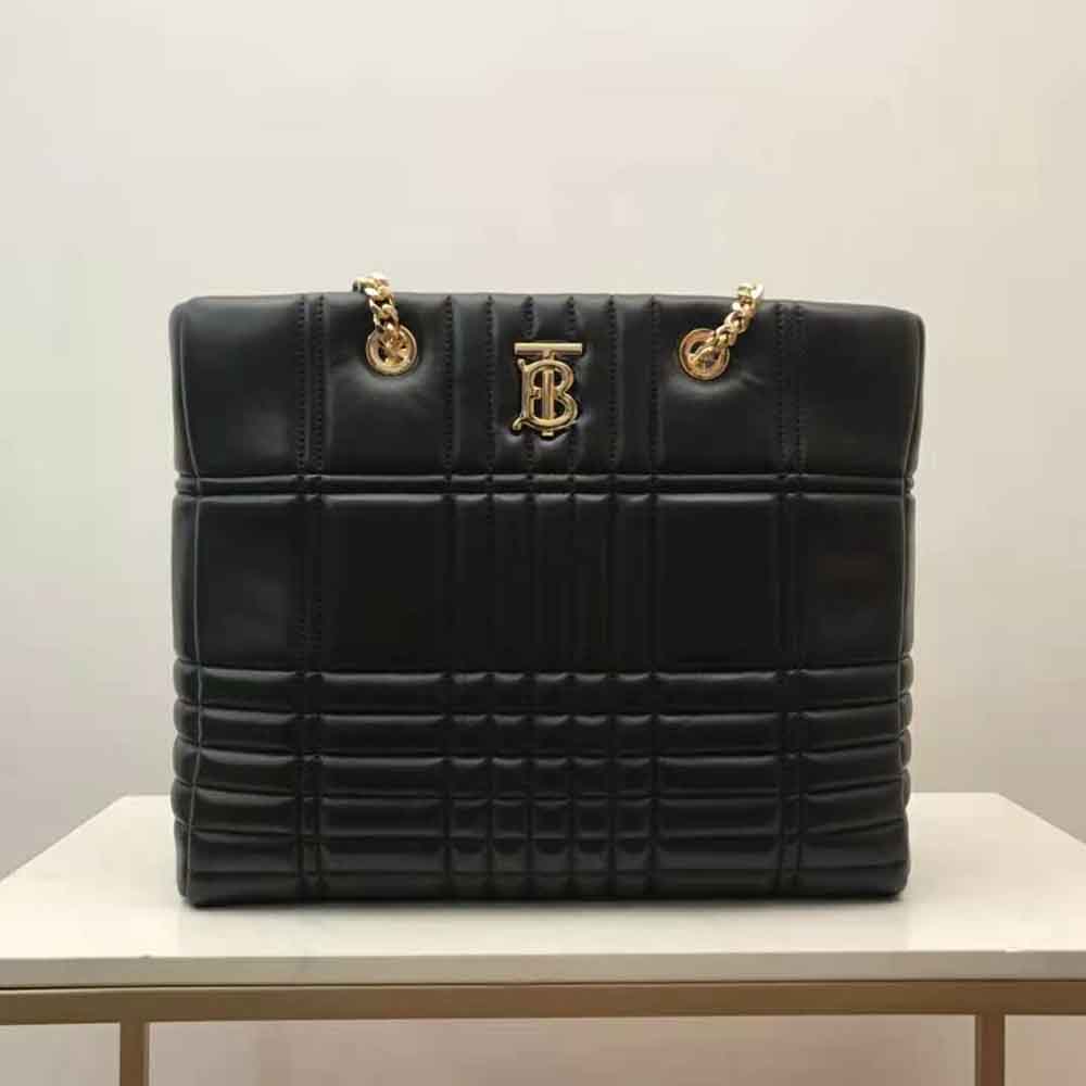 Close-up of Burberry Lola Shopper Bag gold hardware and quilted texture