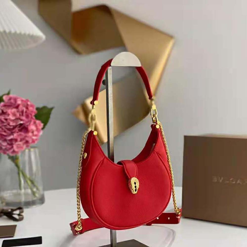 Side angle showing adjustable strap of Bvlgari Women Serpenti Ellipse Crossbody Bag
