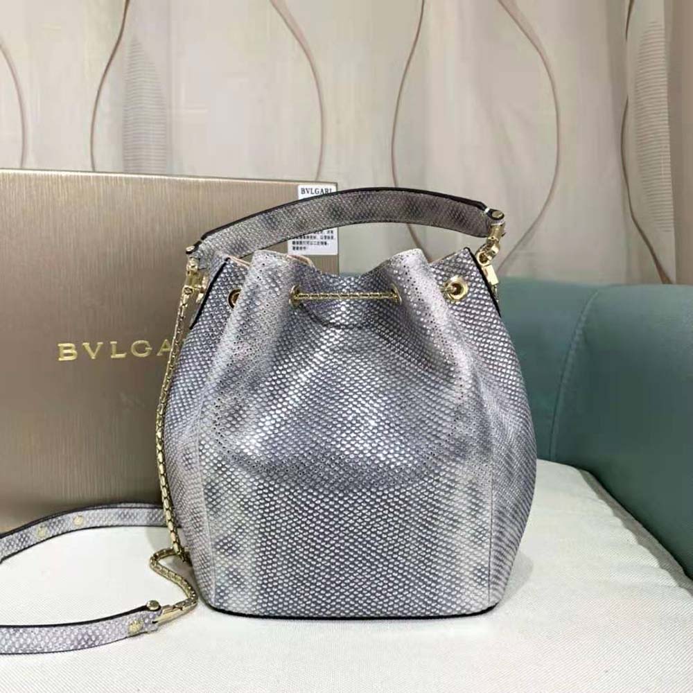 Side angle showing sleek bucket silhouette of Bvlgari Women Serpenti Forever Bucket Bag-Silver