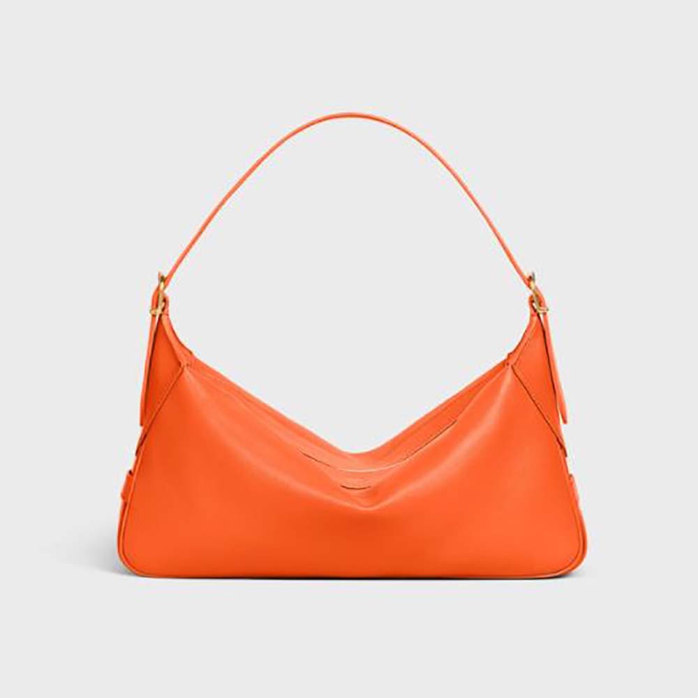 Front view of Celine Women Medium Romy in orange calfskin