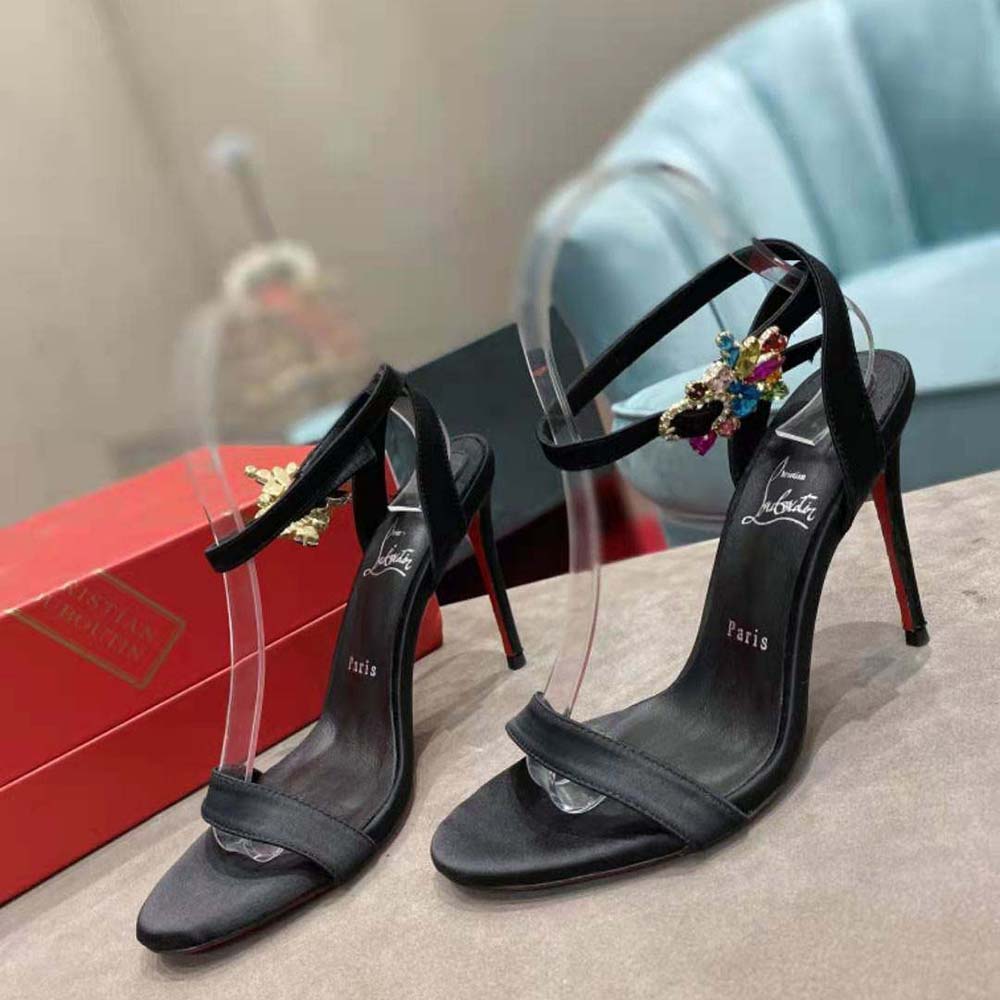 Close-up of gold buckle detail on Christian Louboutin Women Goldie Joli 100 mm Heel Height-Black