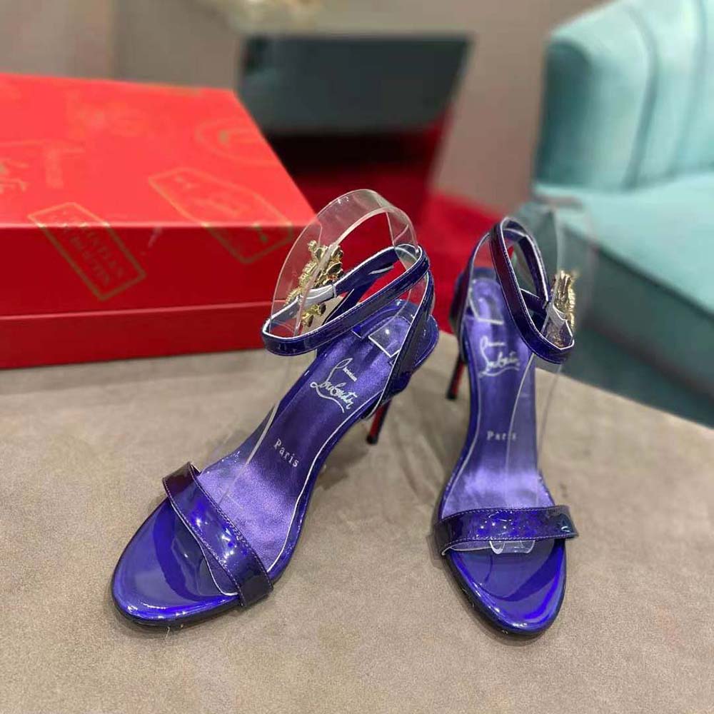 Rear angle showing adjustable buckle and slender heel on Goldie Joli sandal