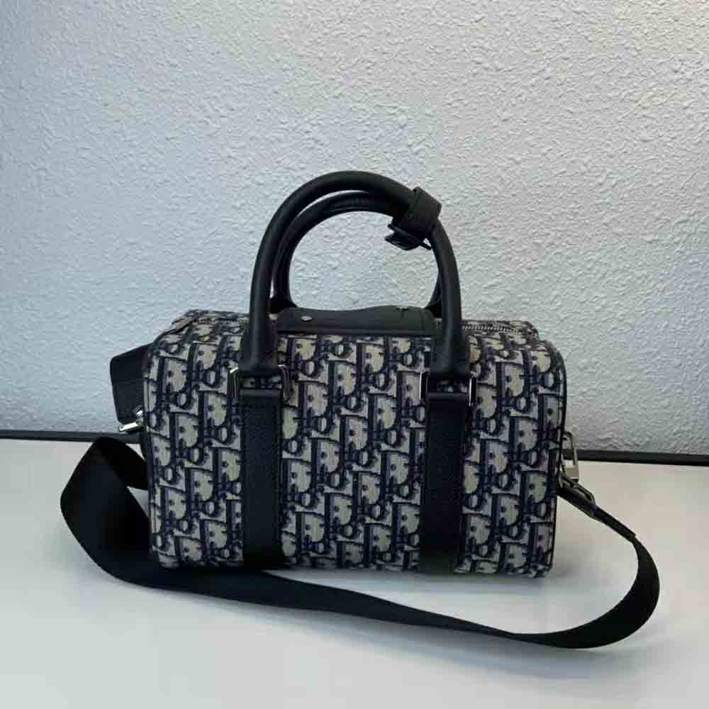 Side profile showing adjustable shoulder strap on Dior Men Lingot 26 Bag