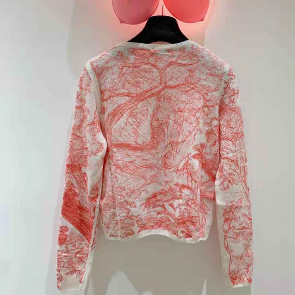 Side angle showing silhouette of Dior Women Chez Moi Pink Cashmere Knit