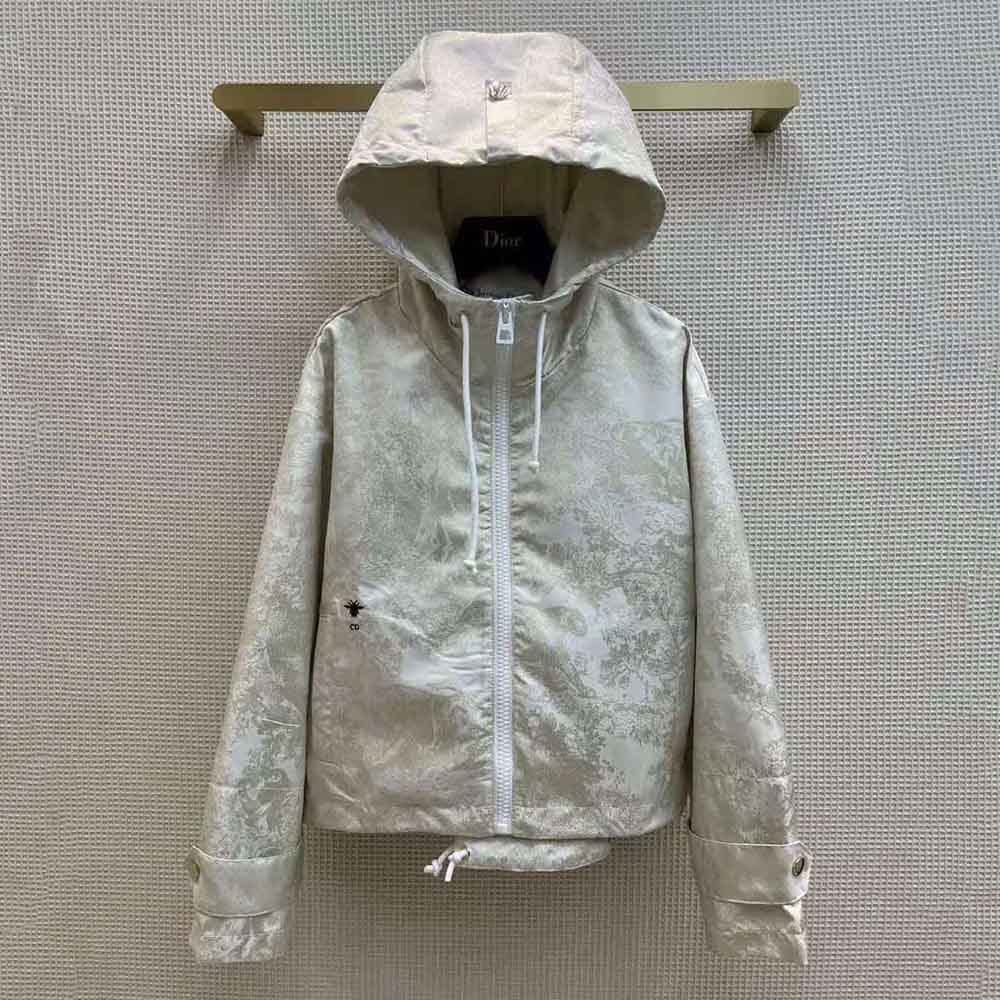 Close-up of gold hardware zipper detail on Dior Women D-Way windbreaker