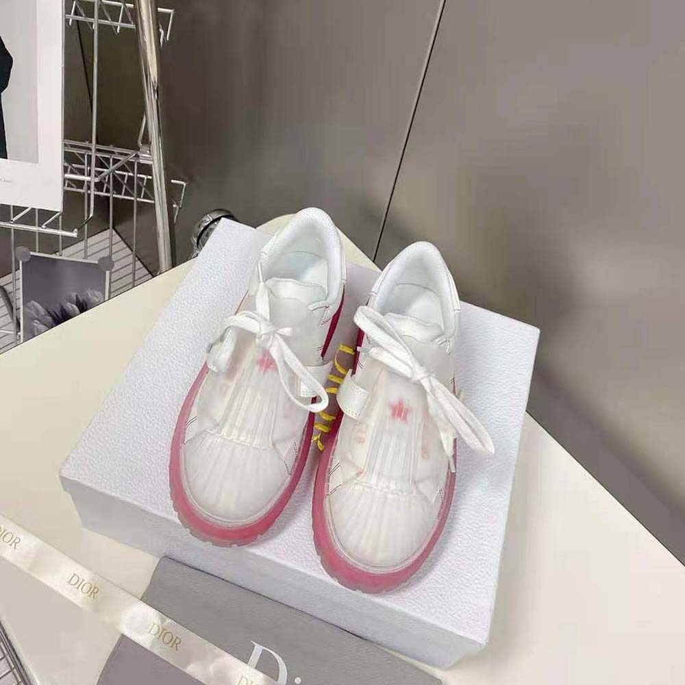 Close-up on Dior branding and transparent red sole on Dior-Id Sneaker