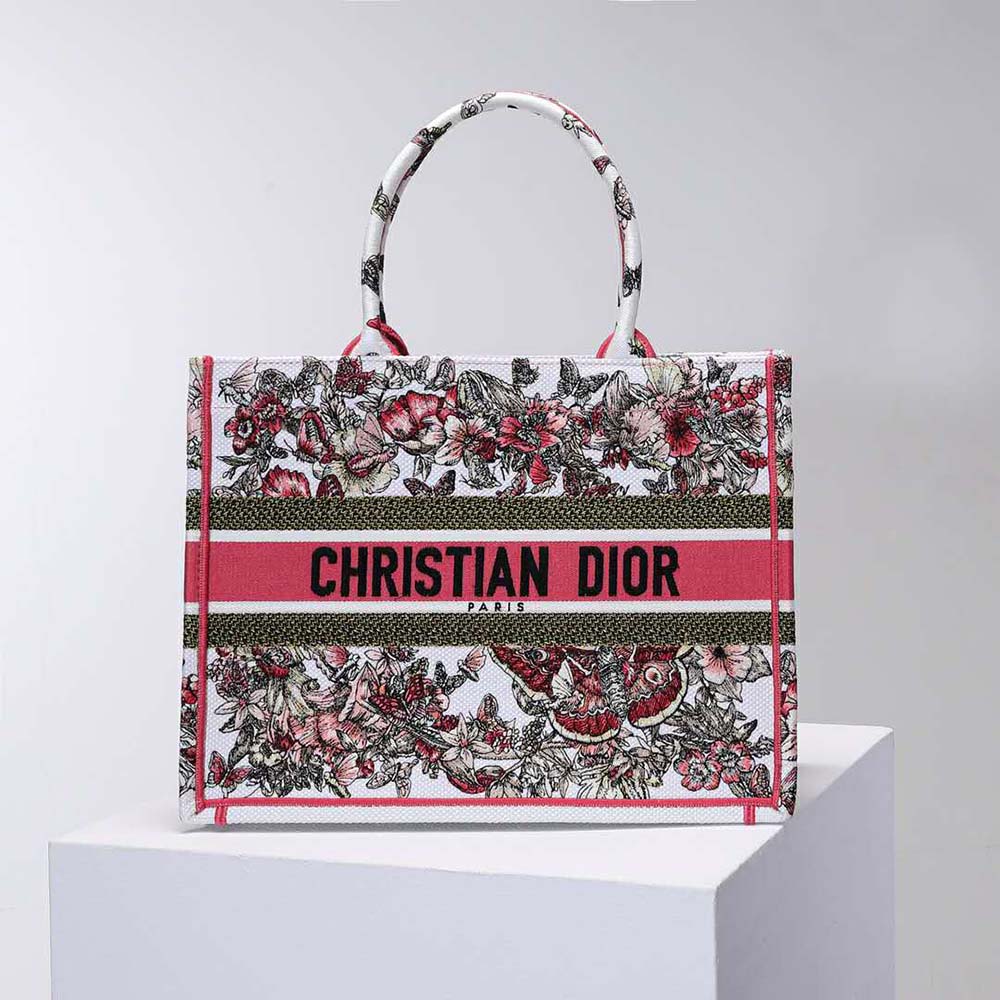 Close-up of vibrant butterfly embroidery on Dior Women Medium Dior Book Tote