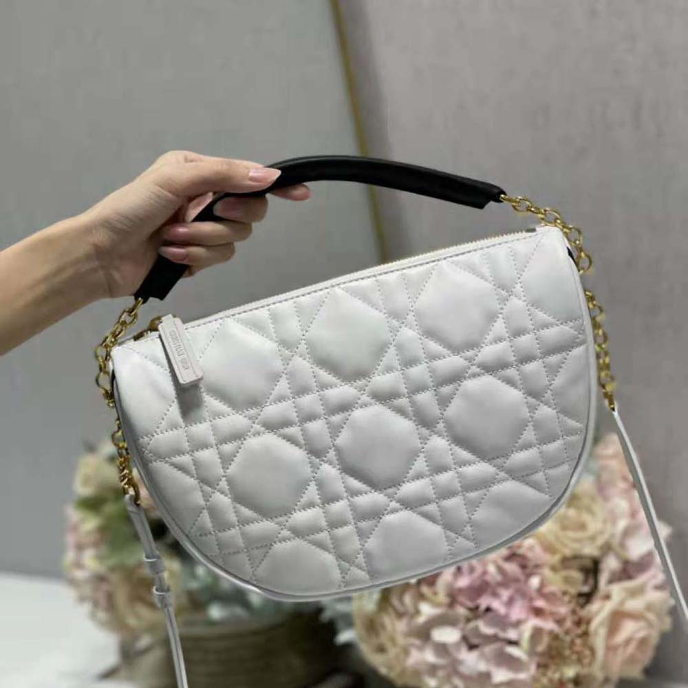 Close-up of Cannage quilting and silver hardware on Dior Vibe Hobo Bag