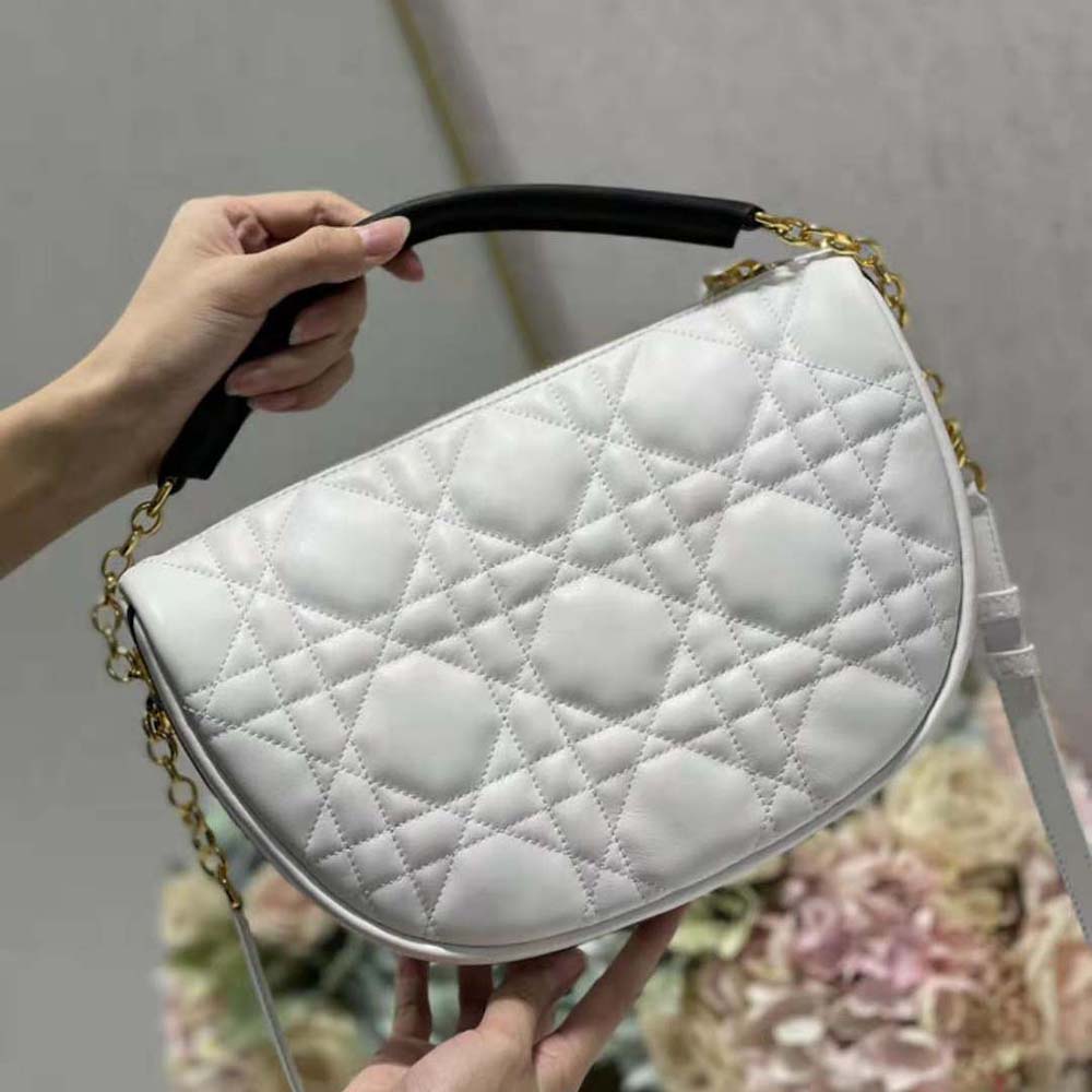 Side profile showing soft lambskin texture of Dior Women Medium Dior Vibe Hobo Bag