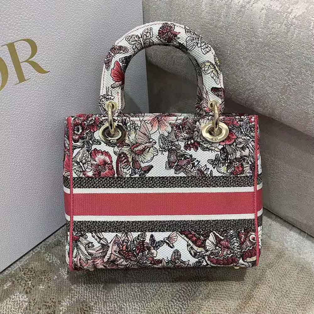 Side angle showing silver hardware on Dior Women Medium Lady D-lite Bag
