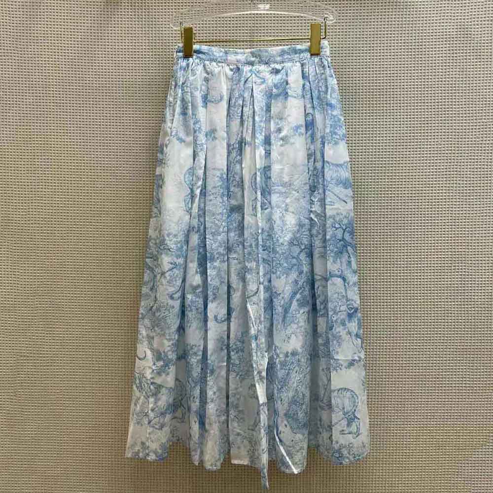 Side angle showing flowing A-line silhouette of Dior Women Mid-Length Skirt in blue