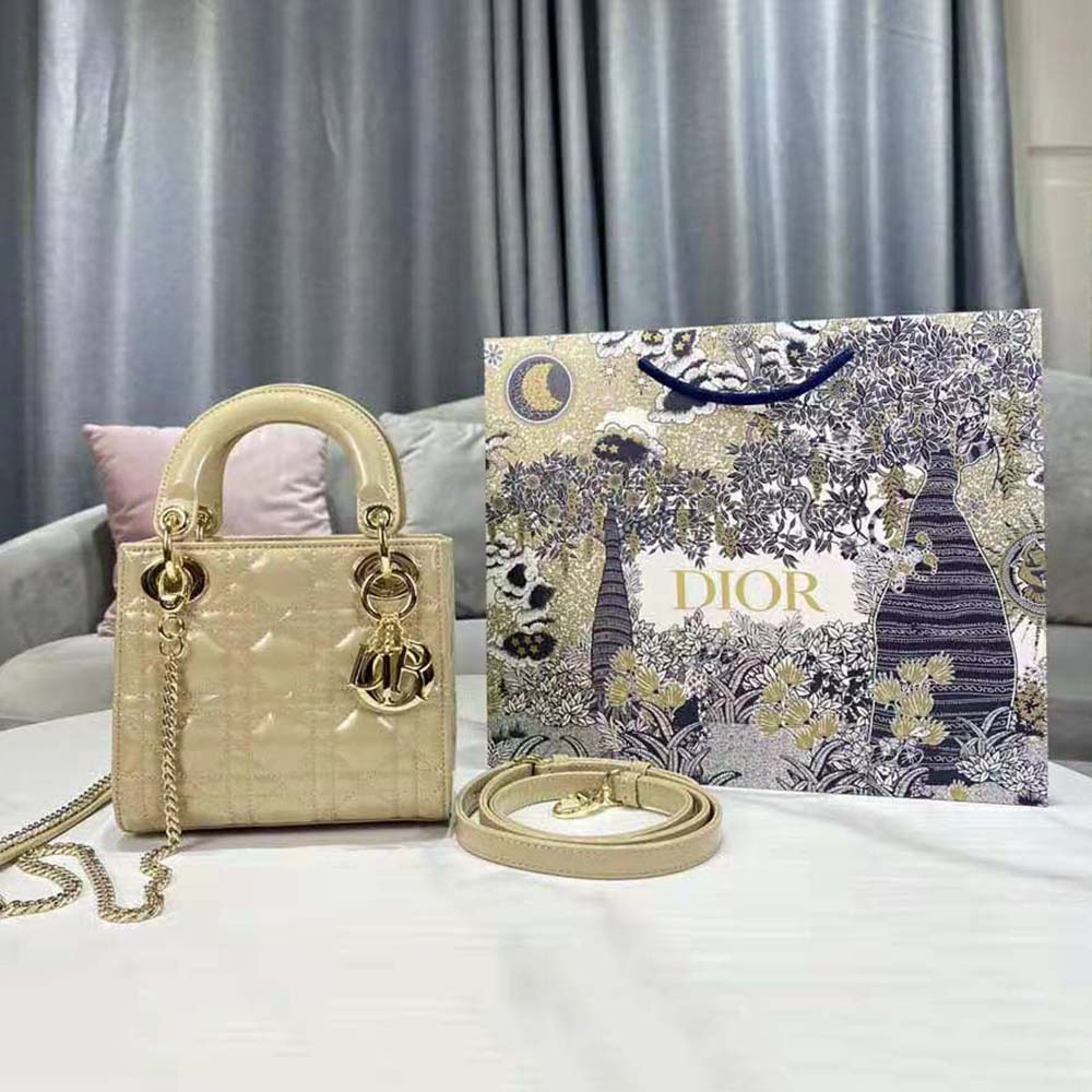 Close-up of signature Cannage quilting and Dior charms on Mini Lady Dior bag