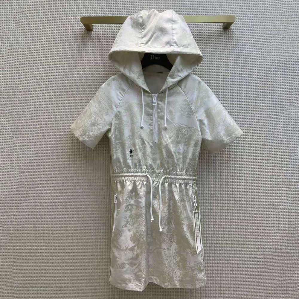 Close-up of gold-tone jacquard fabric on Dior Women Short Hooded Dress