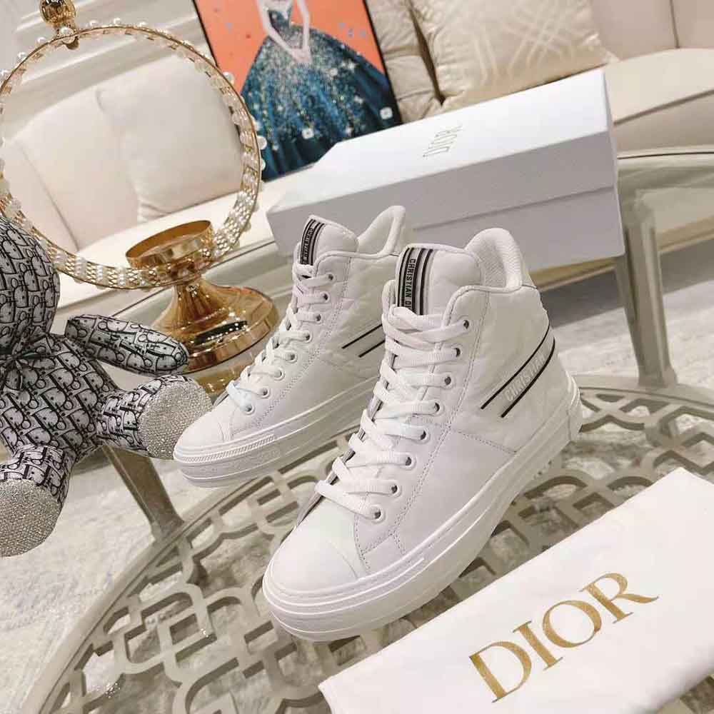 Overhead shot showing white lace-up and silhouette of Dior Women Walk N Dior Star Sneaker