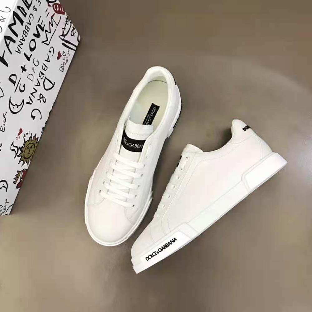 Overhead view showing lace-up closure and sleek silhouette of sneakers