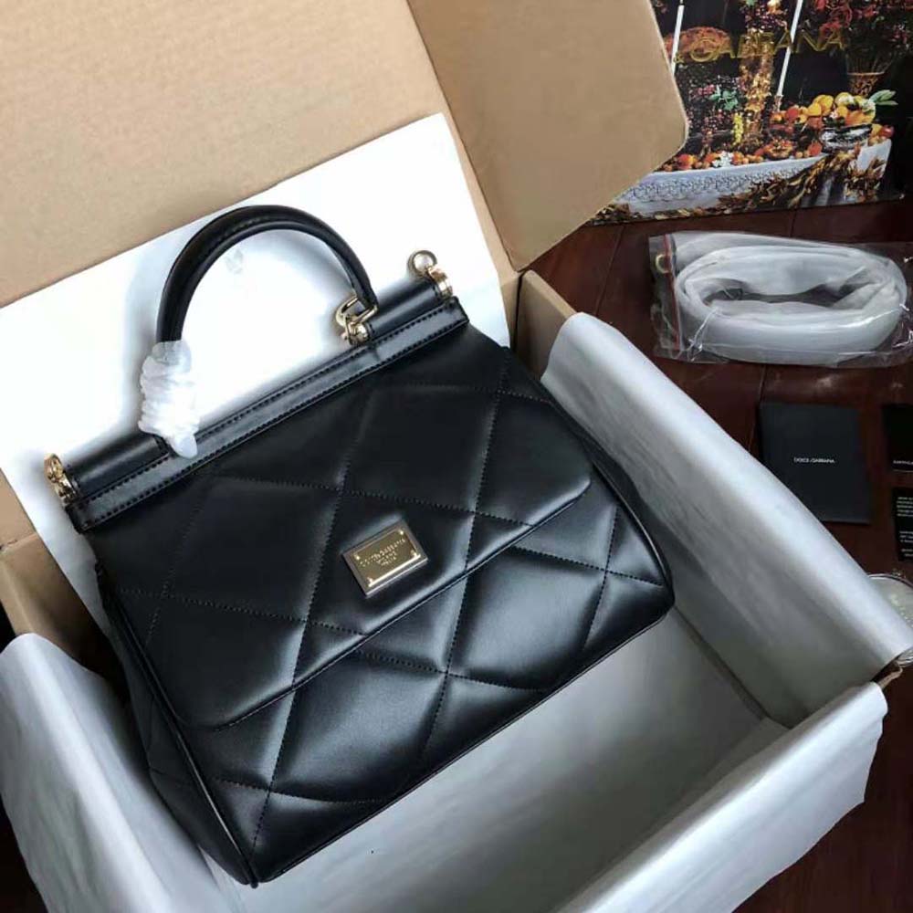 Side angle showing quilted texture and structure of Sicily Bag