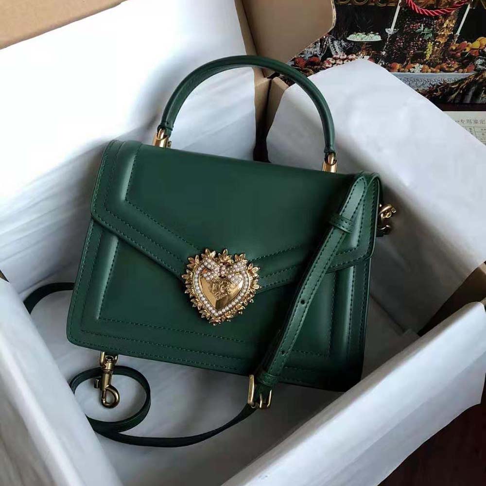 Side angle showing compact silhouette of Dolce Gabbana D&G Small Devotion Bag