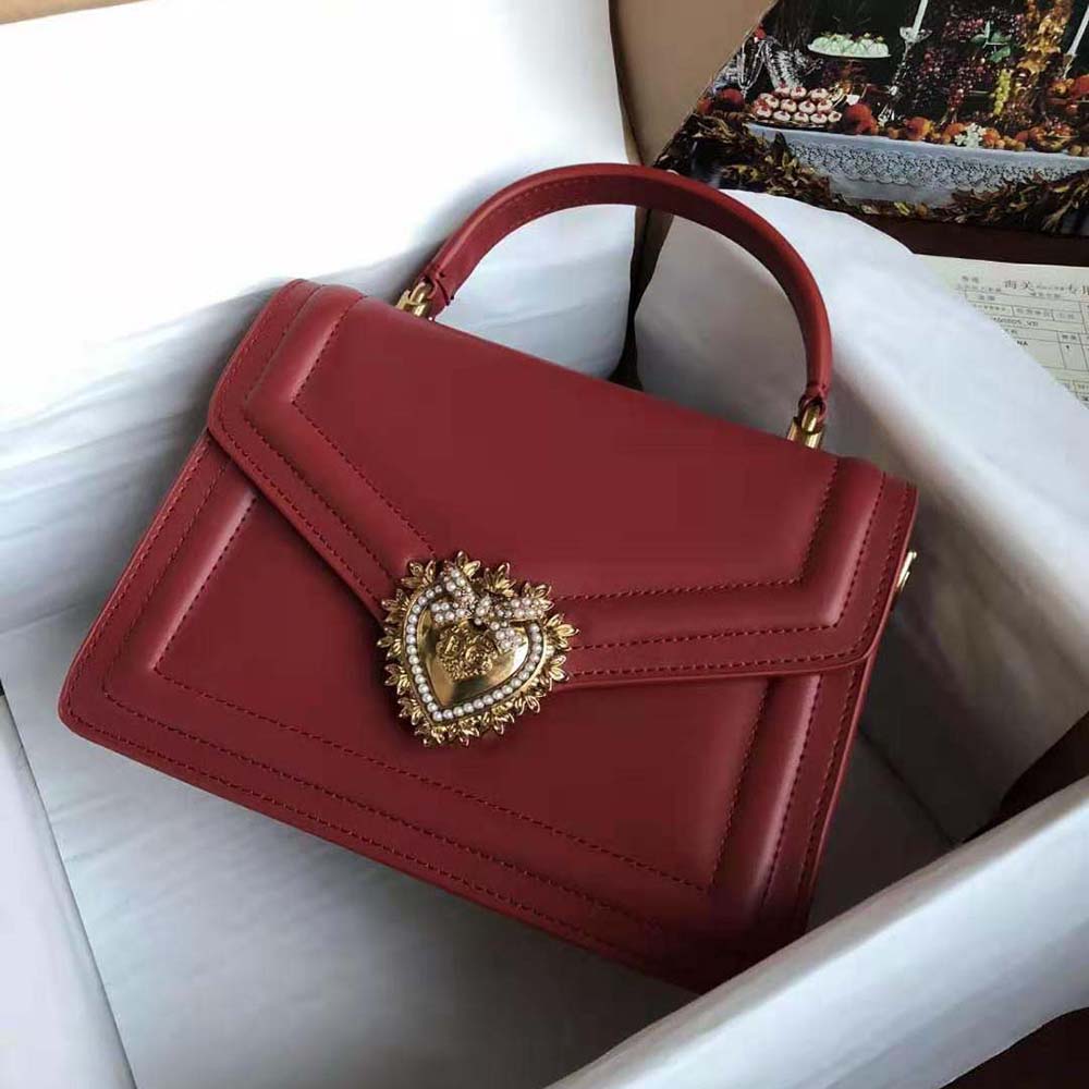 Close-up of gold-tone heart clasp on Dolce Gabbana Devotion Bag-Maroon