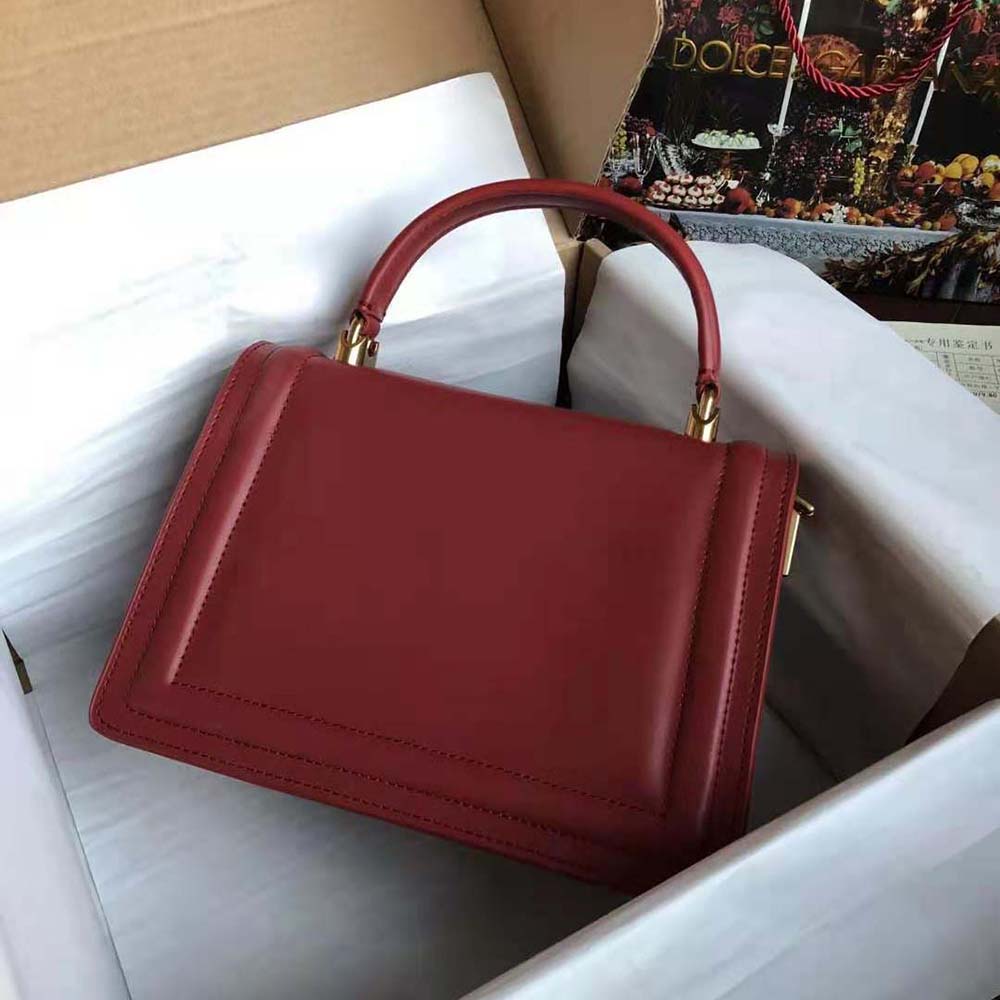 Side angle showing smooth calfskin texture on Dolce Gabbana D&G Devotion Bag