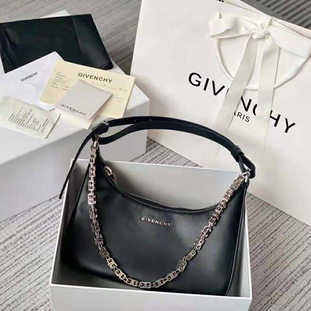 Close-up of moon cutout and silver hardware on Givenchy Women Small Moon Cut Out Bag