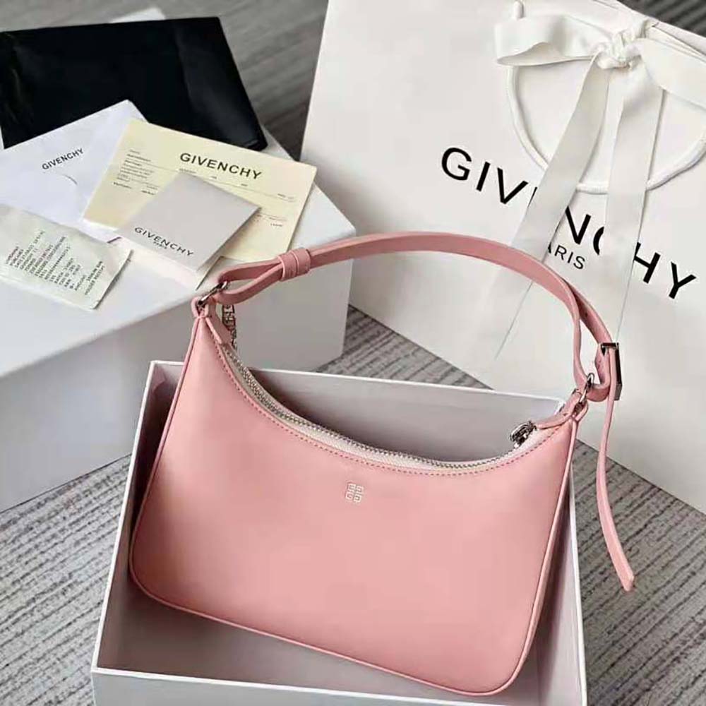 Side angle showing crescent silhouette of Givenchy Women Small Moon Cut Out Bag in Pink
