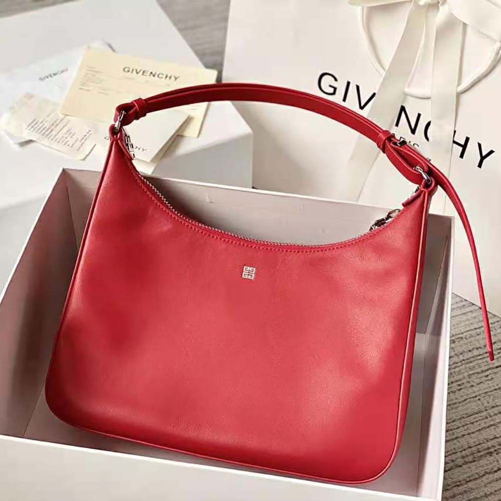 Side profile showing silhouette and adjustable strap of Givenchy Small Moon Bag