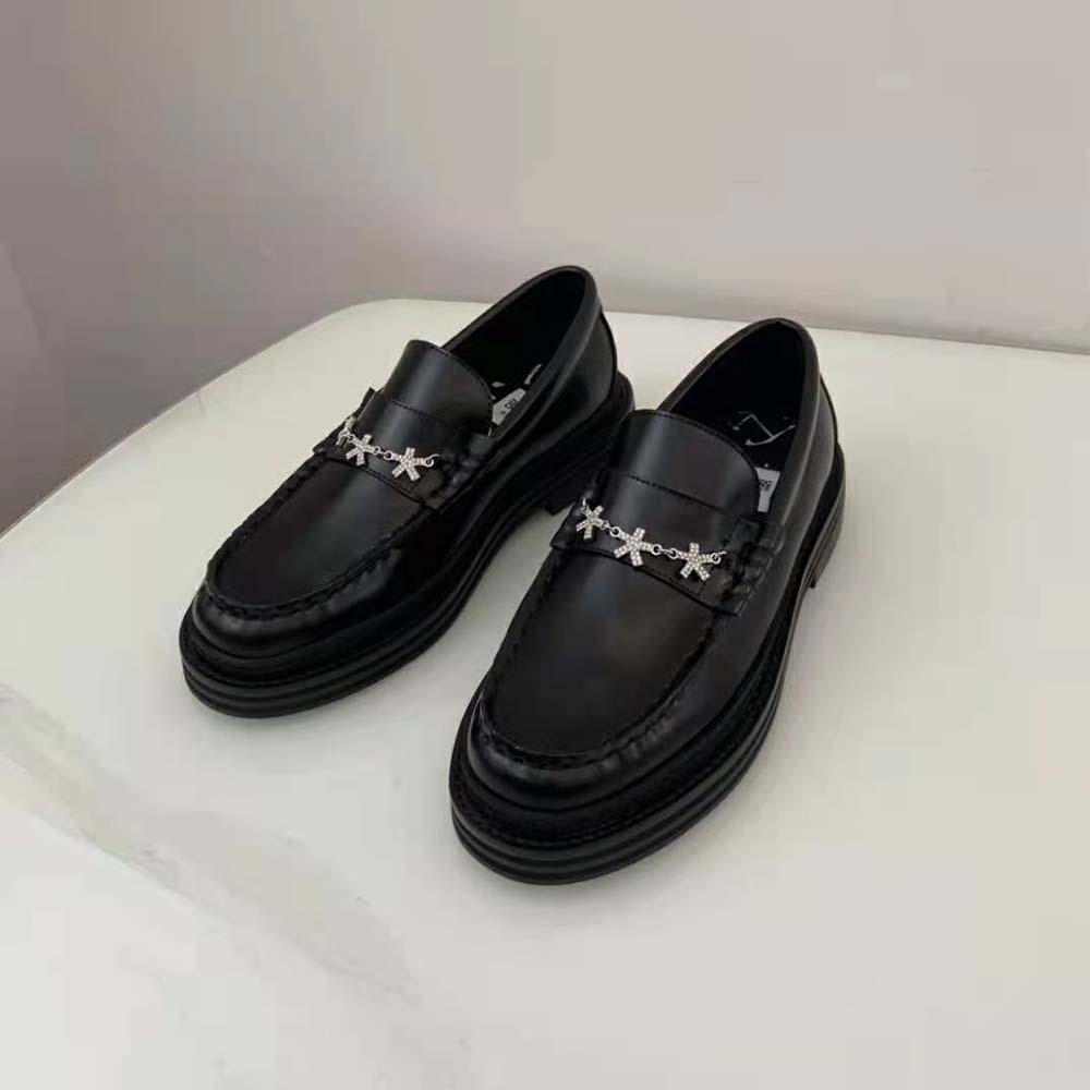 Top view showing black box calf leather on Jimmy Choo men's loafers