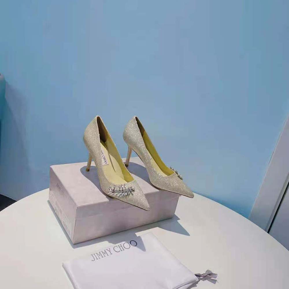 Close-up on the pointed toe and glitter finish of the Jimmy Choo Romy 85 pumps