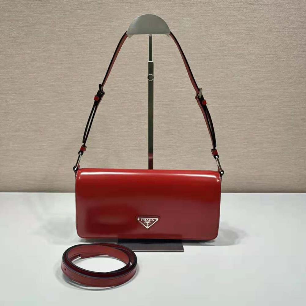 Close-up of brushed leather texture and signature logo on Prada Femme Bag-Red