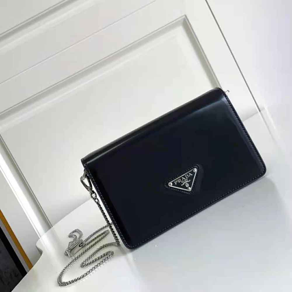 Close-up of silver hardware on Prada Women Brushed Leather Shoulder Bag-Black
