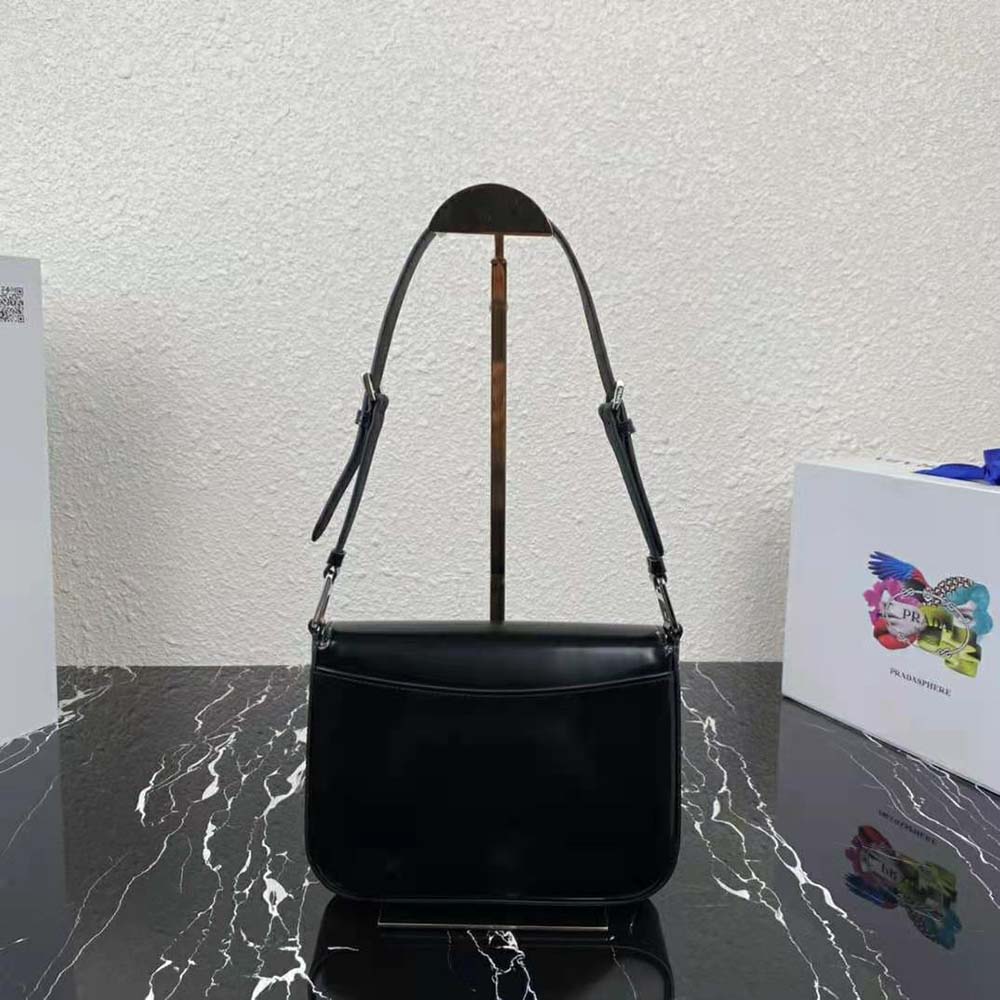 Side angle showing adjustable strap and silhouette of Prada Women Shoulder Bag