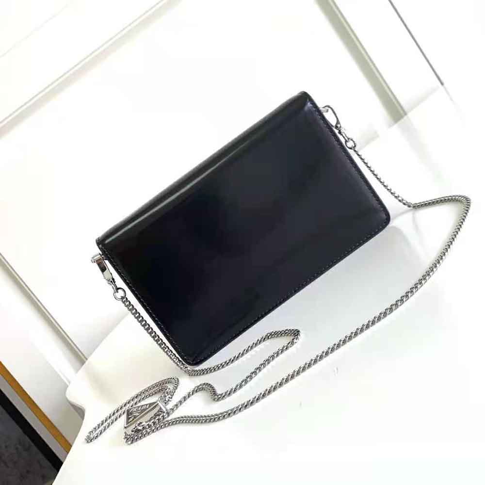 Side angle showing strap detail on Prada Women Brushed Leather Shoulder Bag-Black