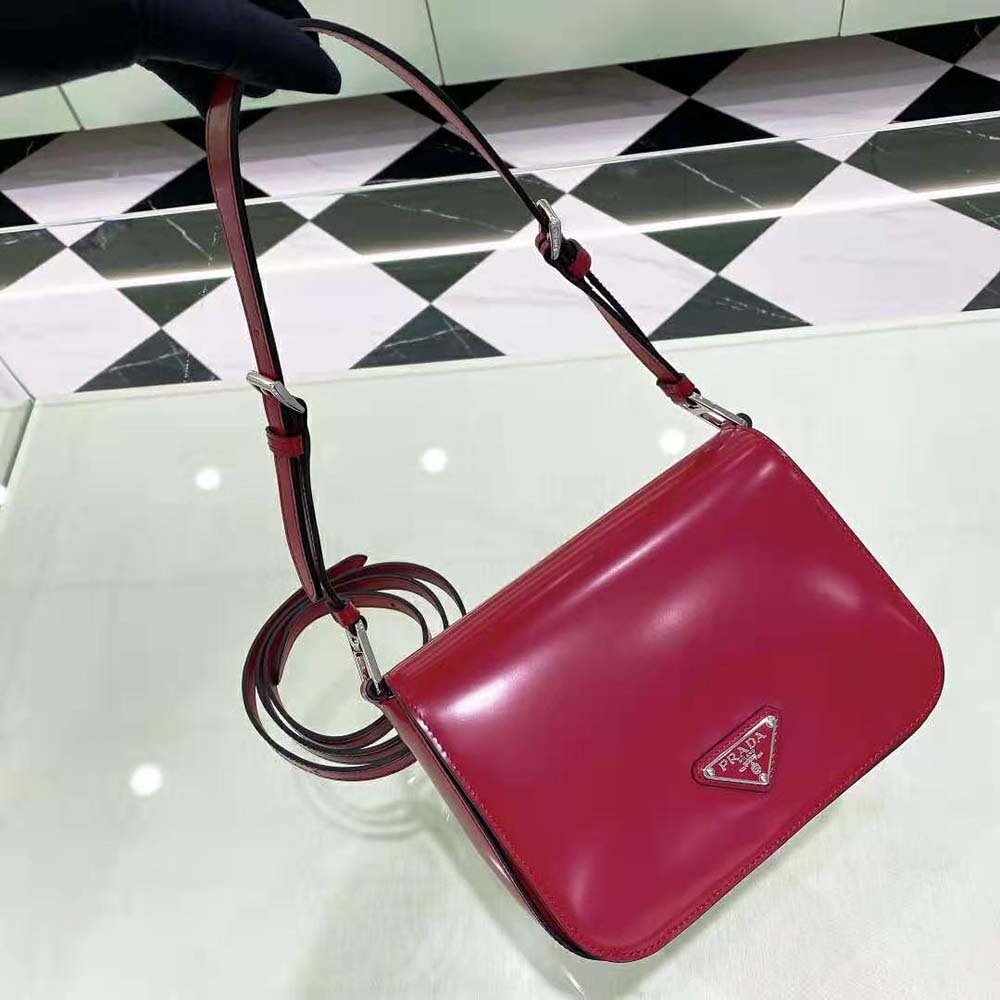 Side angle showing adjustable strap on Prada Women Brushed Leather Shoulder Bag-Red