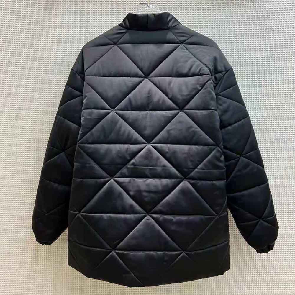 Side angle showing tailored silhouette of Prada Women Emblematic Re-Nylon Jacket