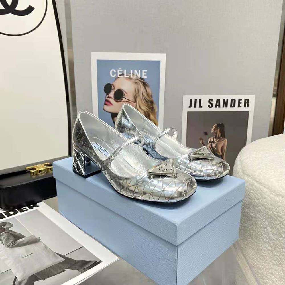 Front angle showcasing sleek silhouette of Prada Women Metallic Leather Pumps