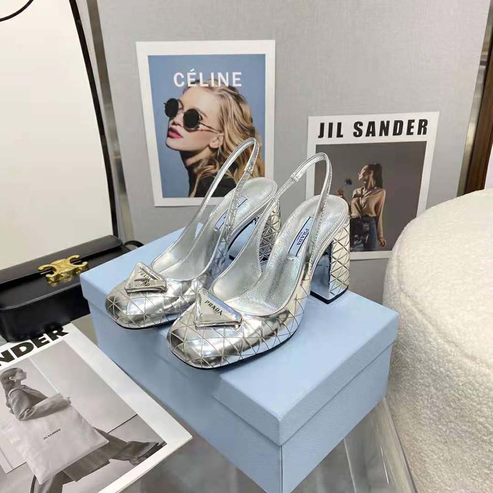 Top view showing pointed toe and slingback strap of Prada silver pumps