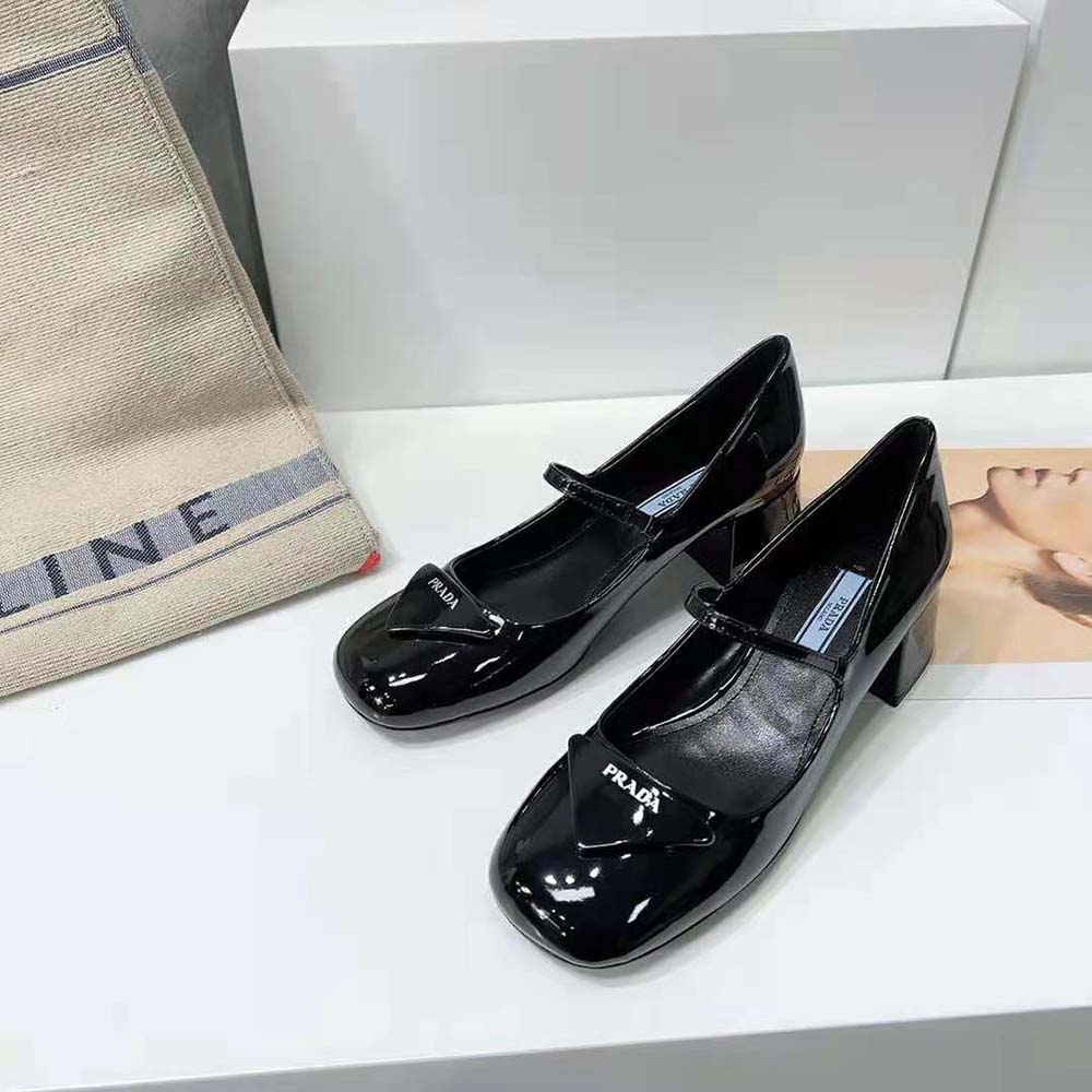Top-down angle showing sleek silhouette of Prada Women Patent Leather Pumps