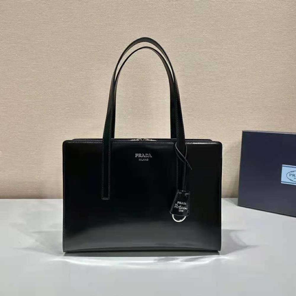 Side angle showing structured silhouette of Prada Women Re-Edition 1995 handbag