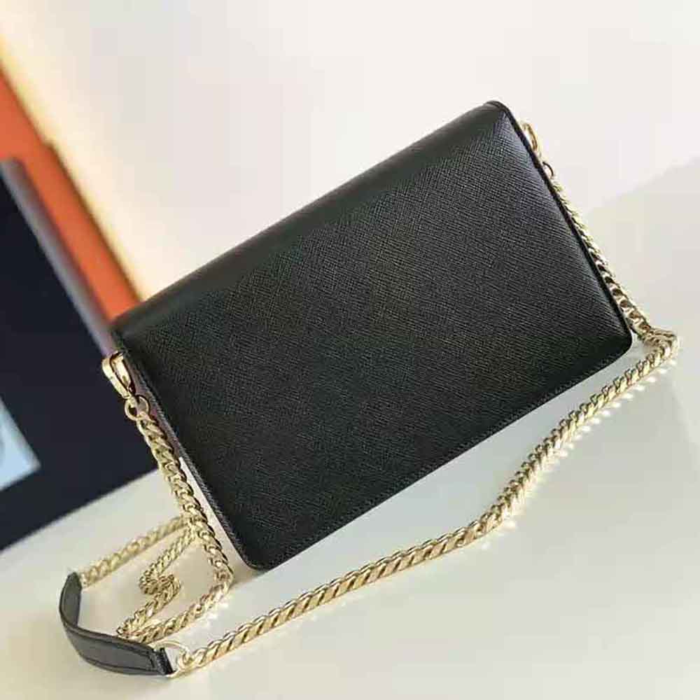 Side angle showing adjustable strap on Prada Women Saffiano Leather Shoulder Bag-Black