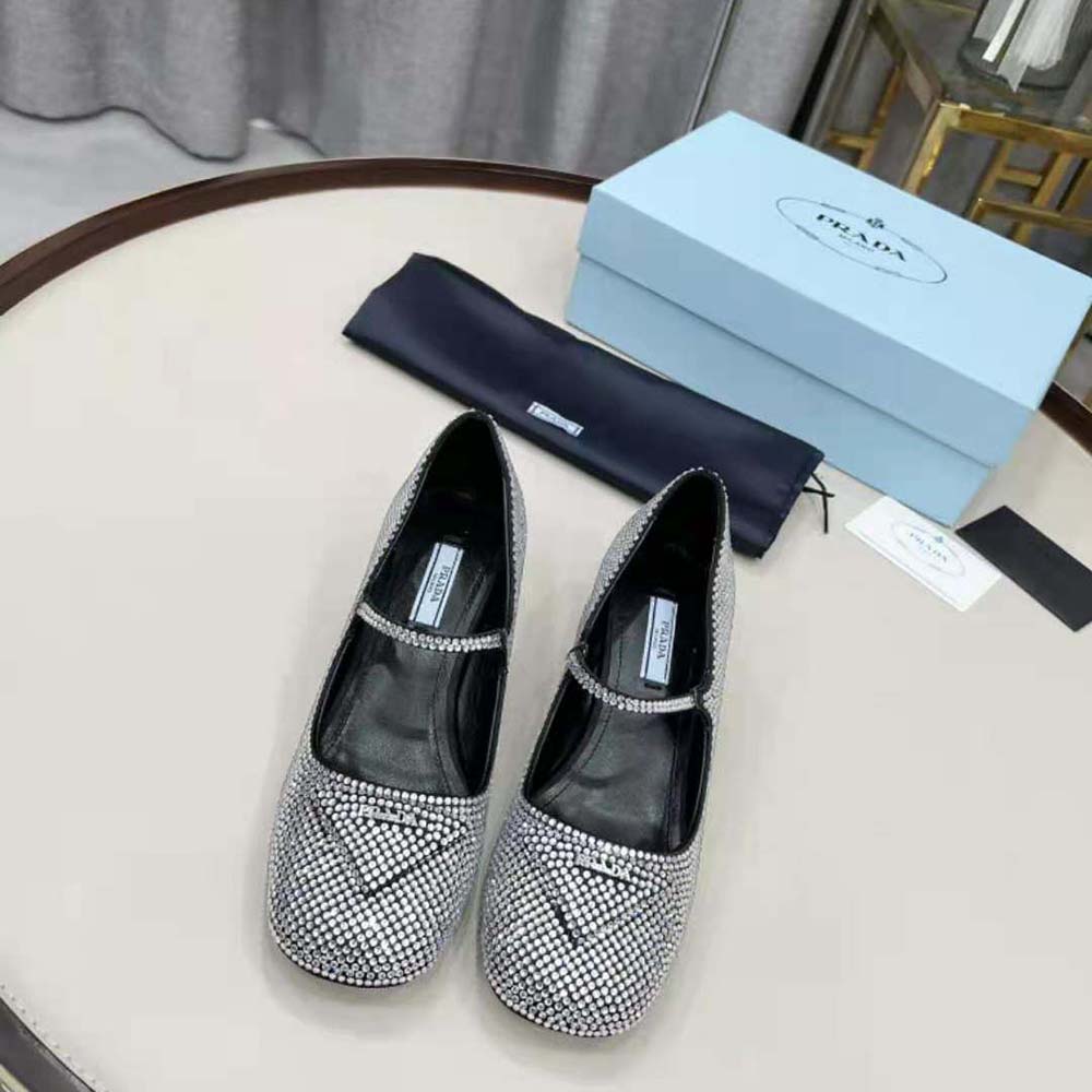Rear angle showing slender 45mm heel of Prada Women Satin Pumps silver