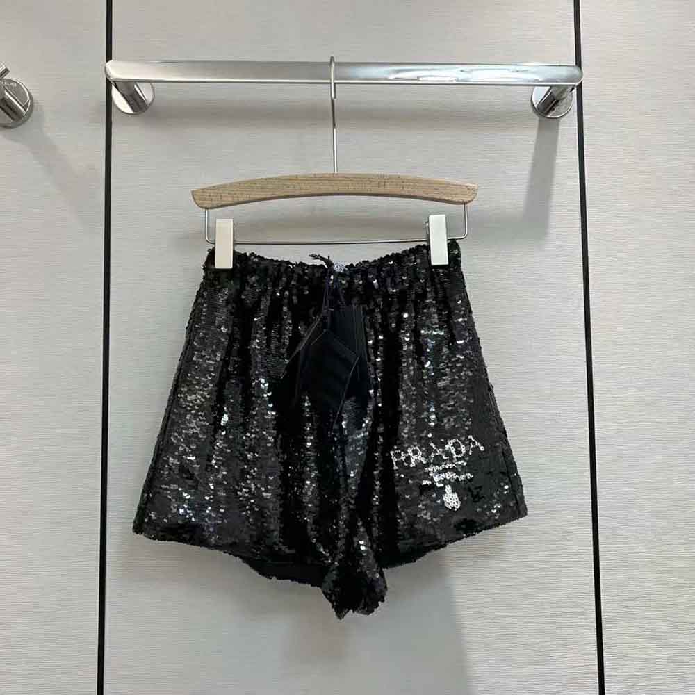 Close-up of sequins and chiffon texture on Prada shorts
