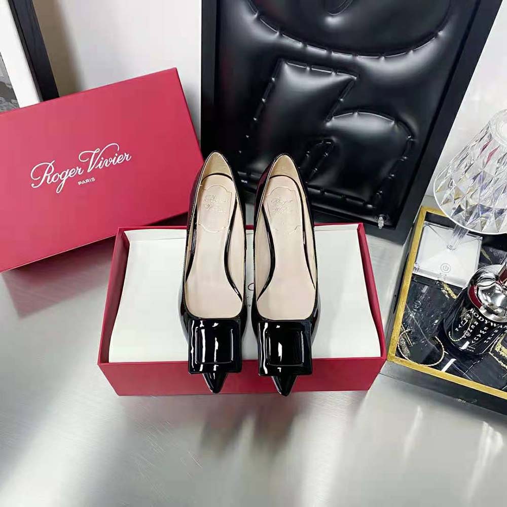 Close-up of signature buckle on Roger Vivier Women Viv In The City Pumps
