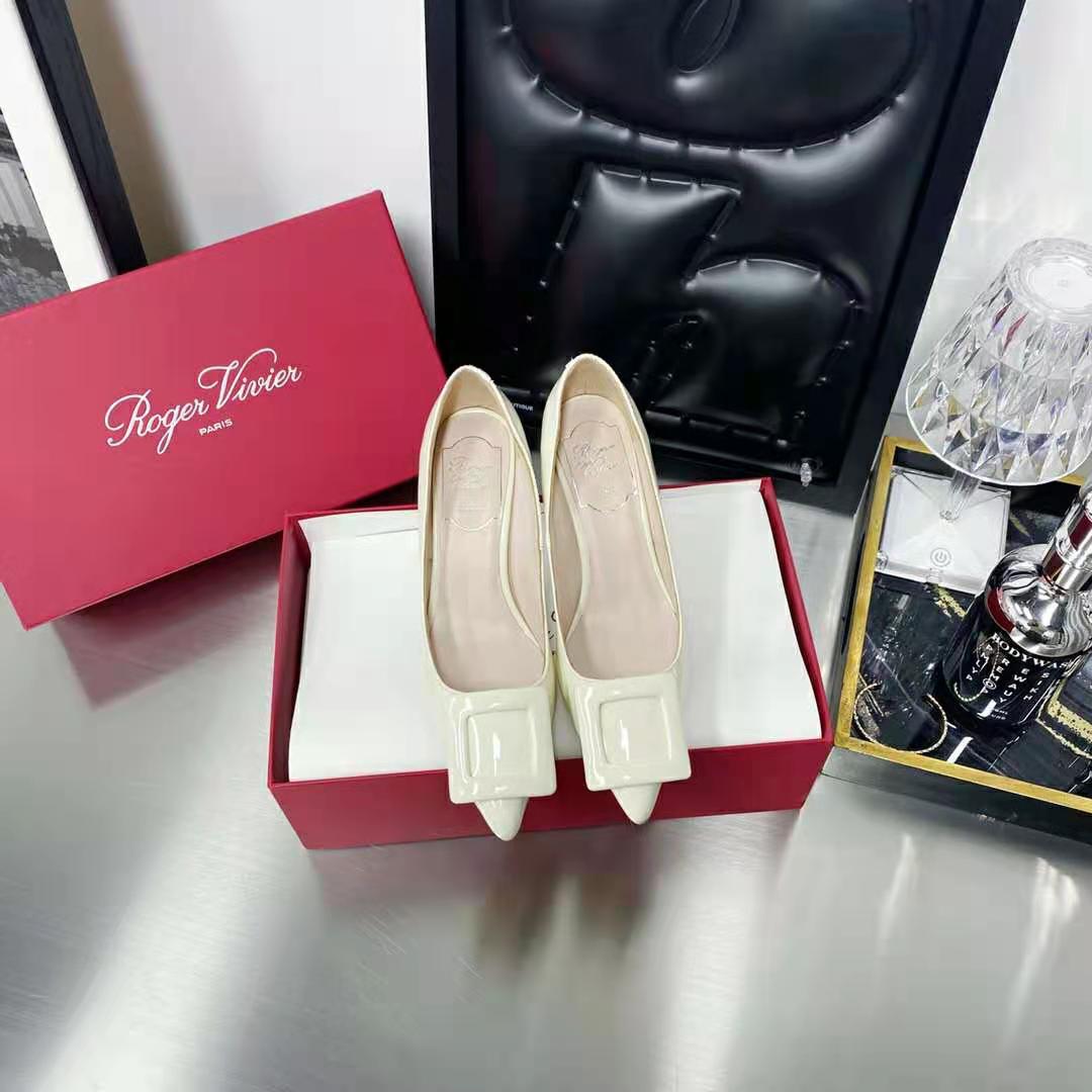 Close-up of signature buckle on Roger Vivier Women Viv In The City Pumps