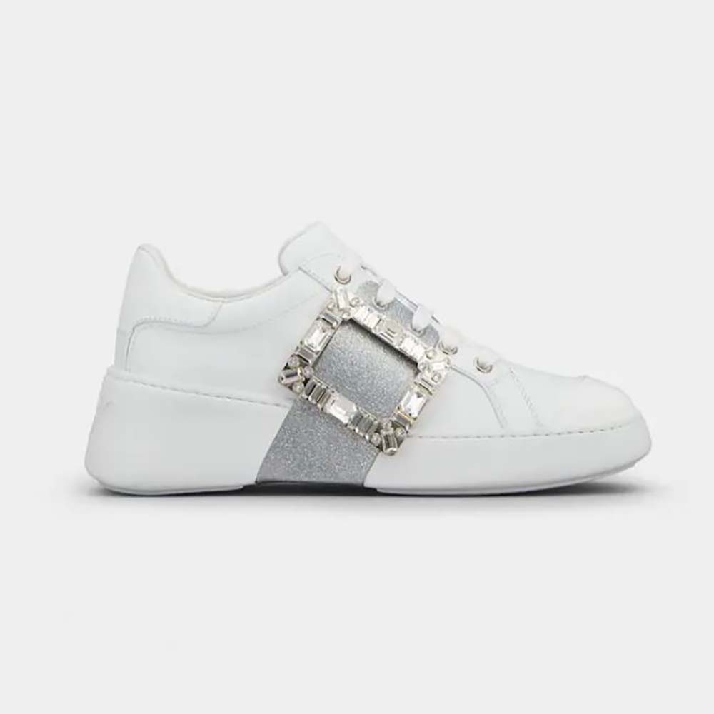 Side view of Roger Vivier Viv’ Skate Glitter Strass Buckle Sneakers in silver leather