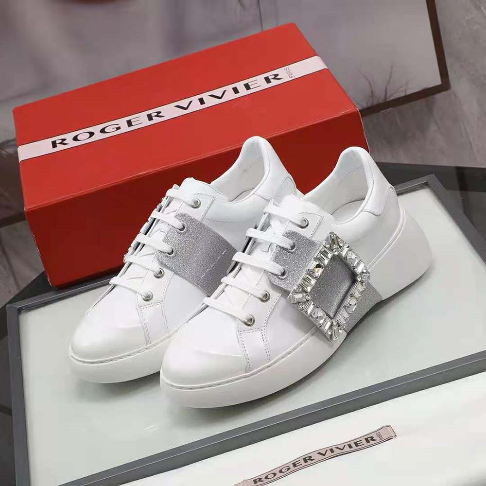 Close-up on sparkling strass buckle detail of Roger Vivier Viv’ Skate Sneakers