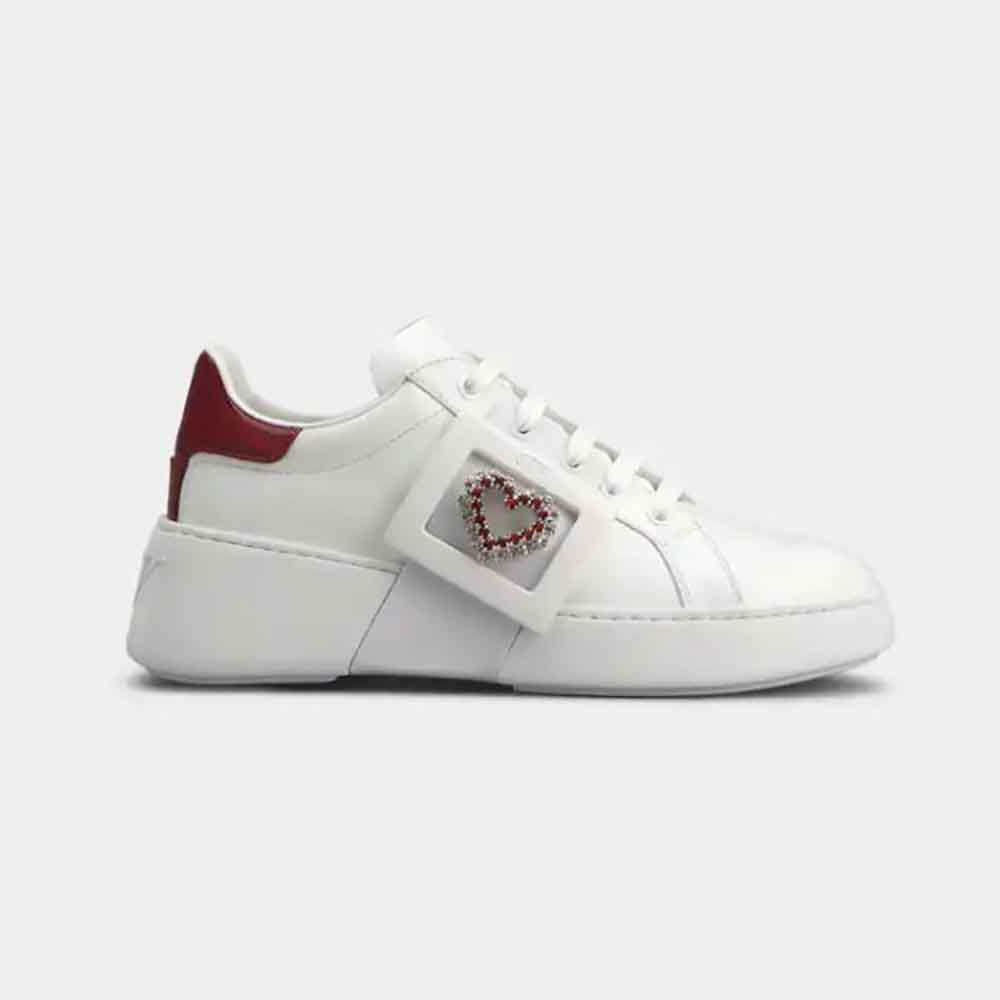 Side view of Roger Vivier Women Viv Skate Love Buckle Sneakers in white patent leather