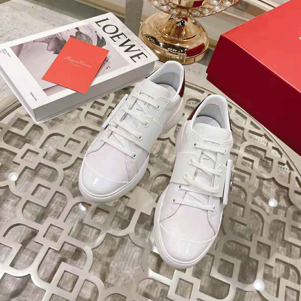 Close-up of oversized Love buckle on Roger Vivier Women Viv Skate Love Buckle Sneakers