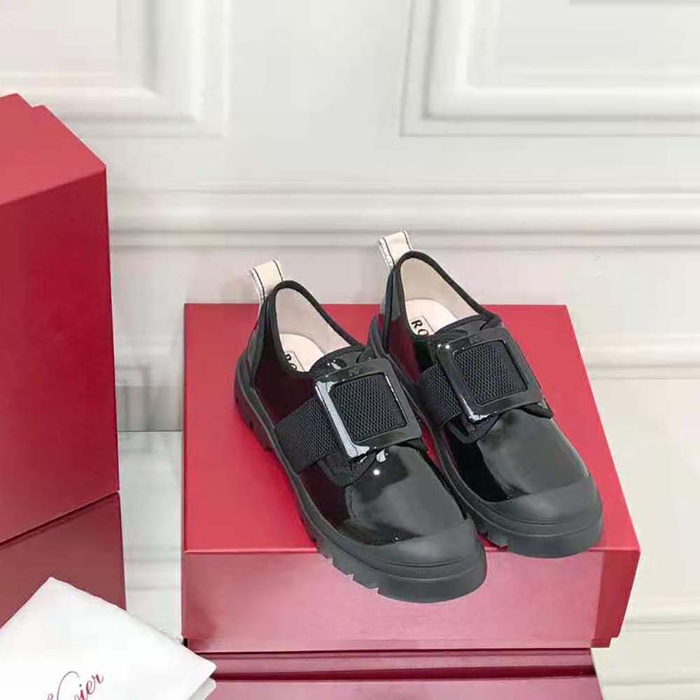 Close-up of polished buckle detail on Roger Vivier Walky Viv Lacquered Buckle Sneakers